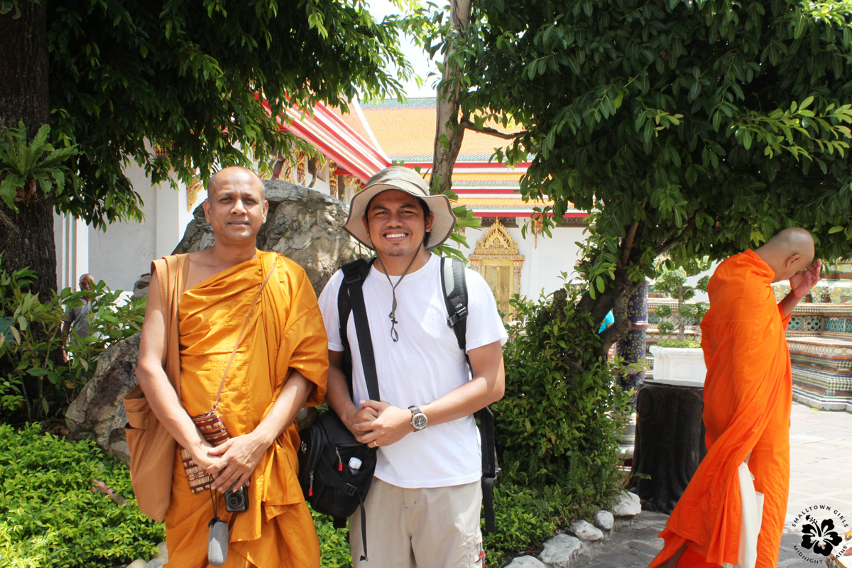 Posing with monks at Wat Pho